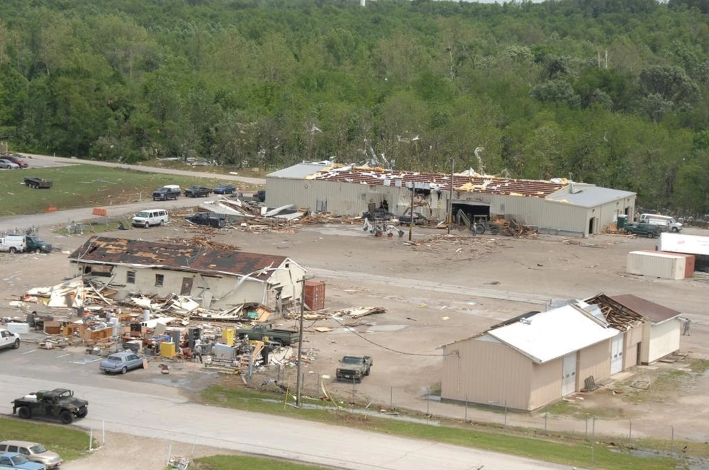 Tornado damage to buildings and vehicles at Camp Atterbury in June 2008
